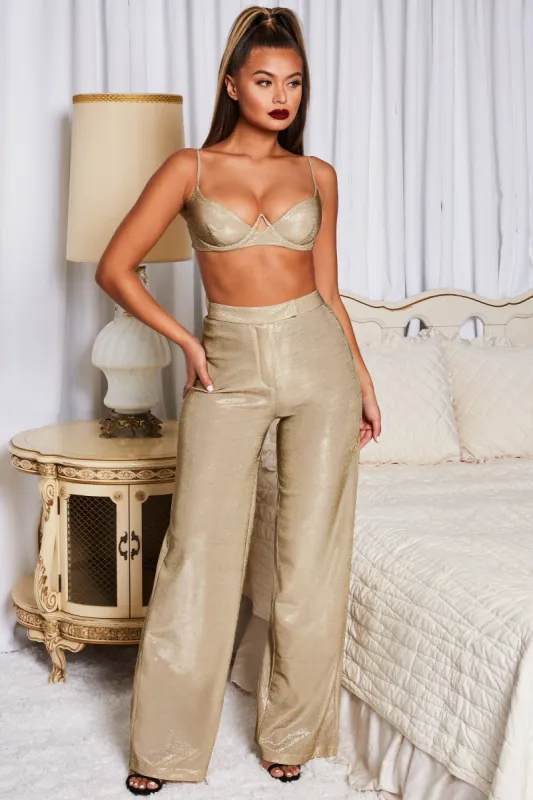 Dancing Queen Metallic Wide Leg Trousers in Gold sold by Oh Polly