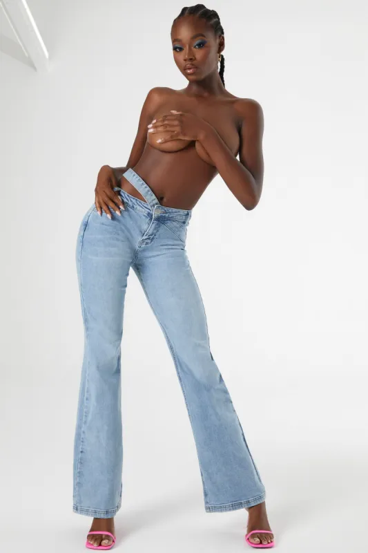 Mid Rise Flared Jeans in Medium Blue Wash sold by Oh Polly
