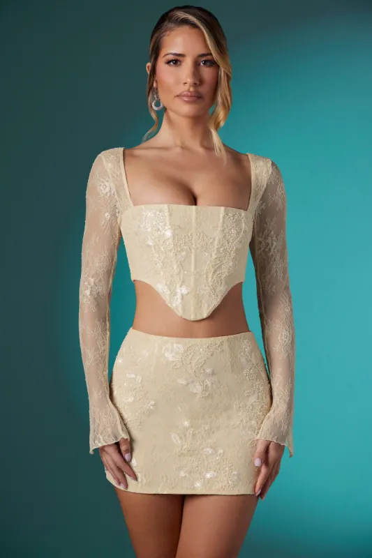 Long Sleeve Embellished Lace Corset Crop Top in Ivory sold by Oh Polly