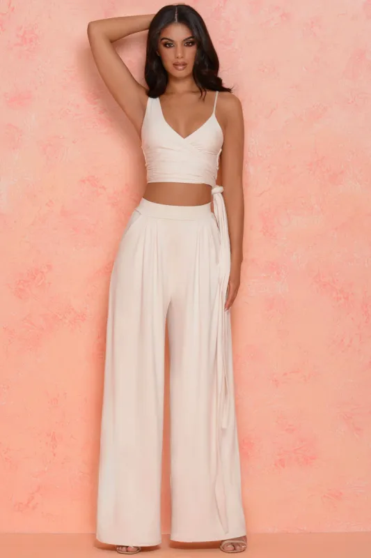 Under Wraps Petite Wide Leg Trousers in Cream sold by Oh Polly