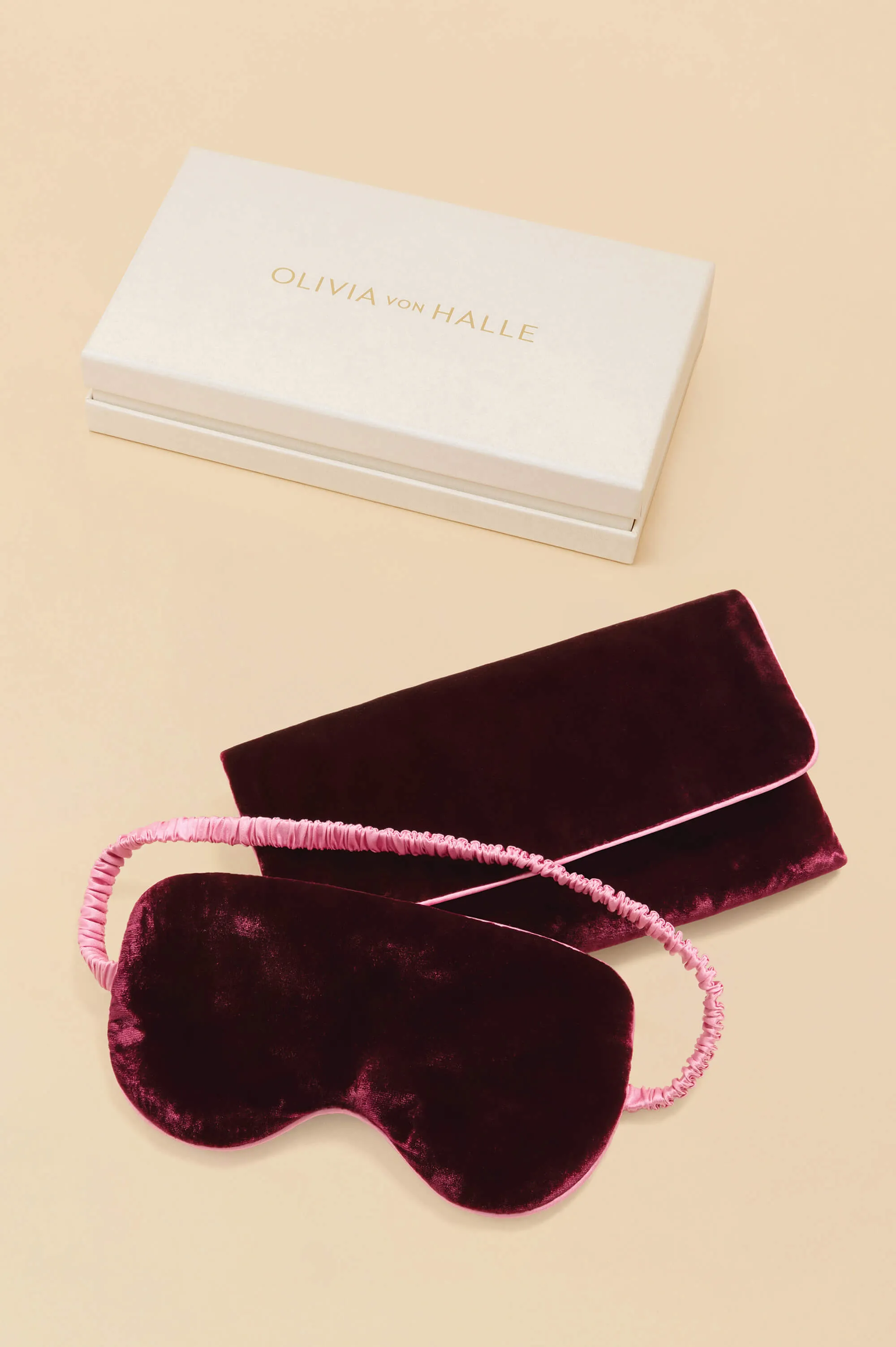 Audrey Claret Red Eye Mask in Silk Velvet sold by Olivia von Halle