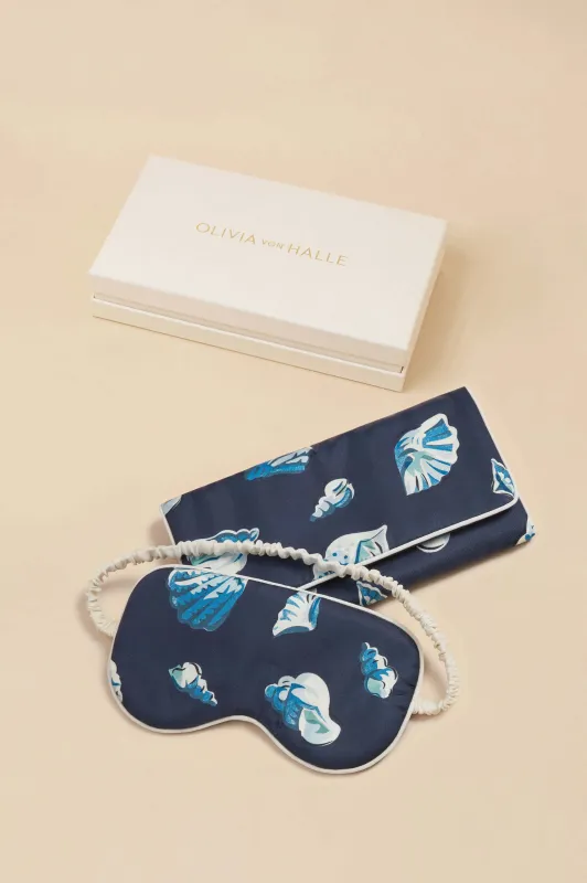 Audrey Nautilus Navy Seashell Eye Mask in Silk Twill sold by Olivia von Halle