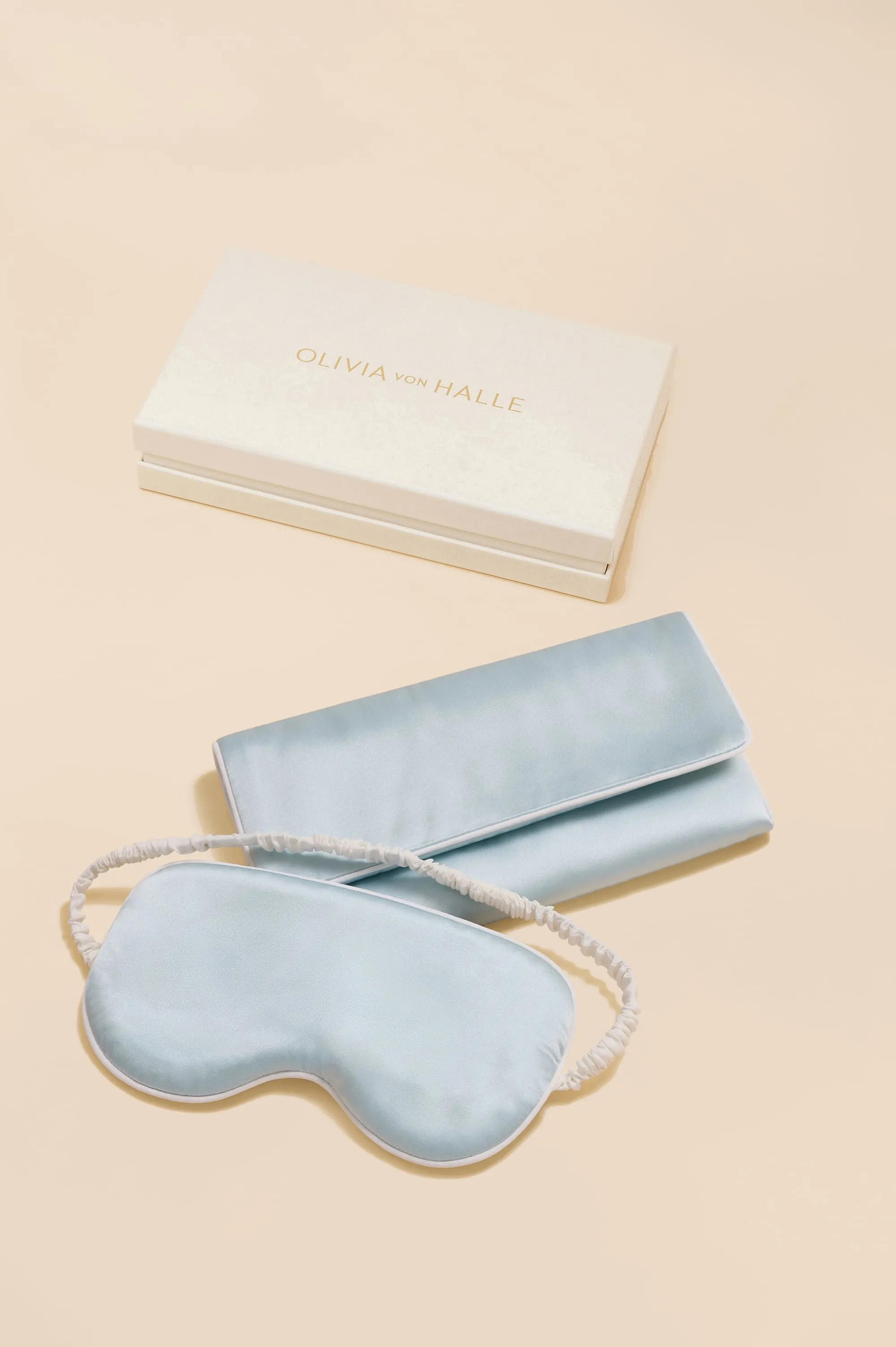 Audrey Powder Blue Ivory Eye Mask in Silk Satin sold by Olivia von Halle
