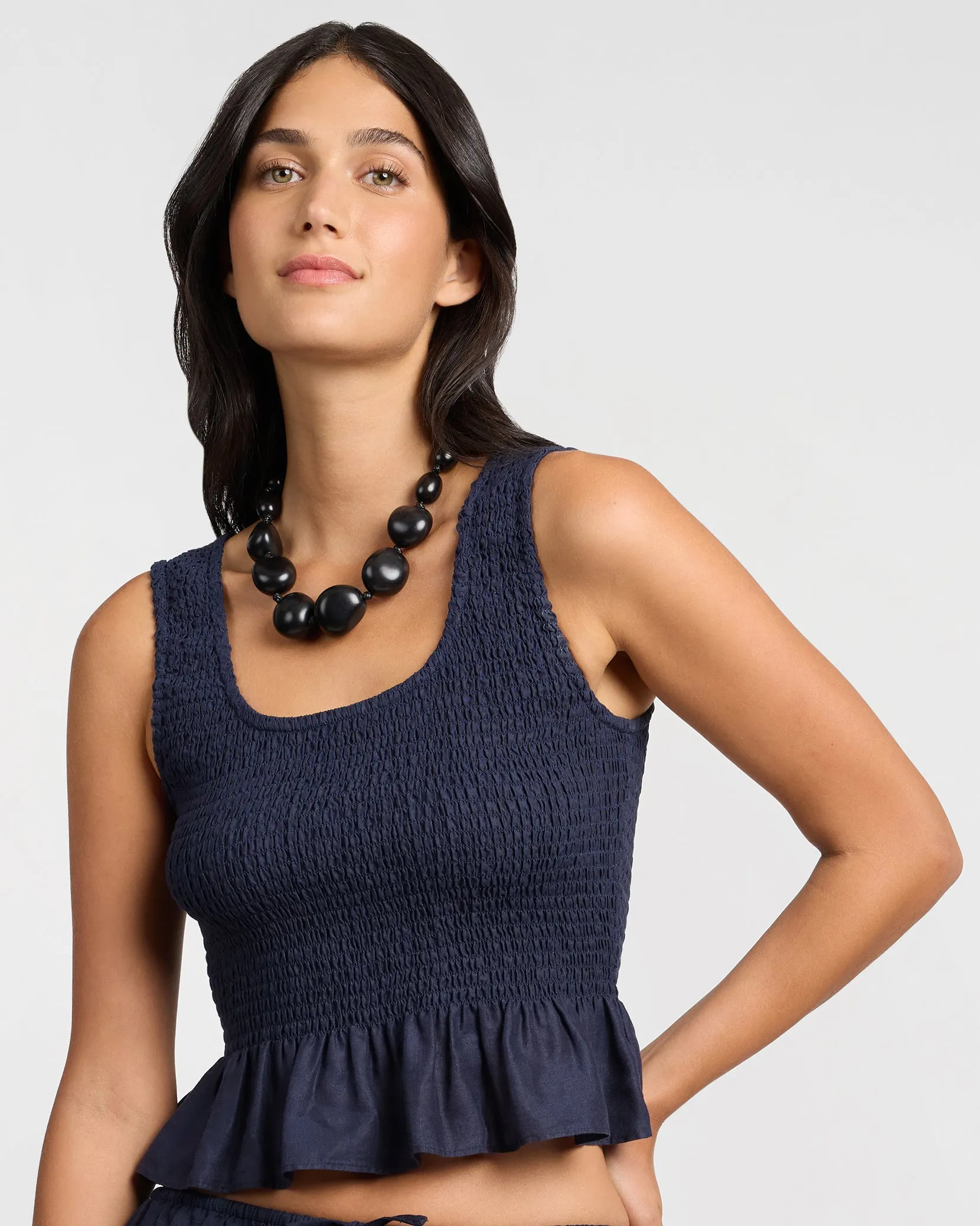 Air Linen Smocked Tank sold by Onia