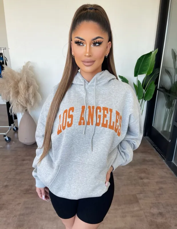 “LA” Oversized Hoodie (Grey/Orange) sold by OOTDFash