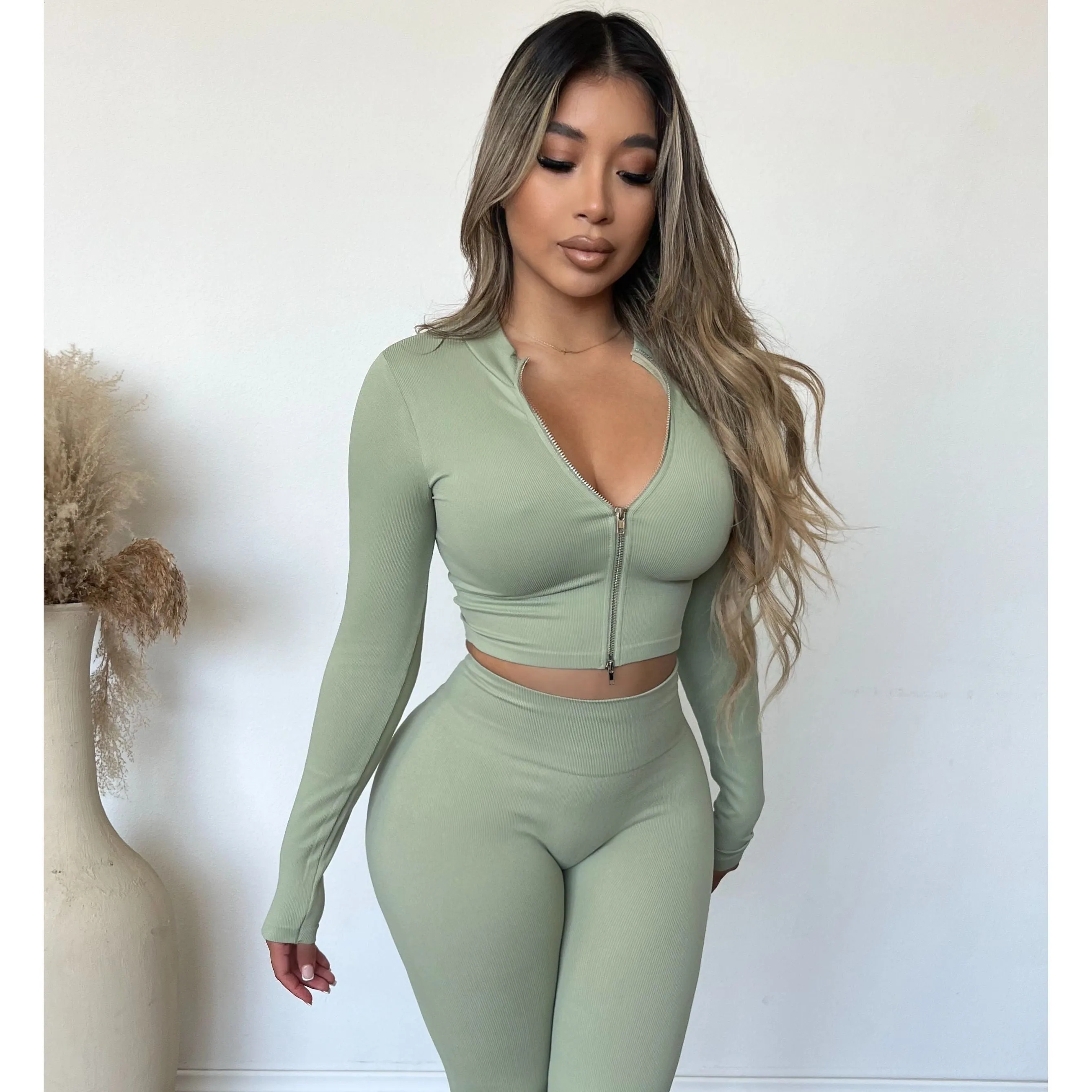 Stacy Long Sleeve Zip Up Top (Dessert Sage) sold by OOTDFash