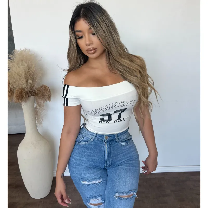 Andrea Off The Shoulder Graphic Crop Tee (White) sold by OOTDFash