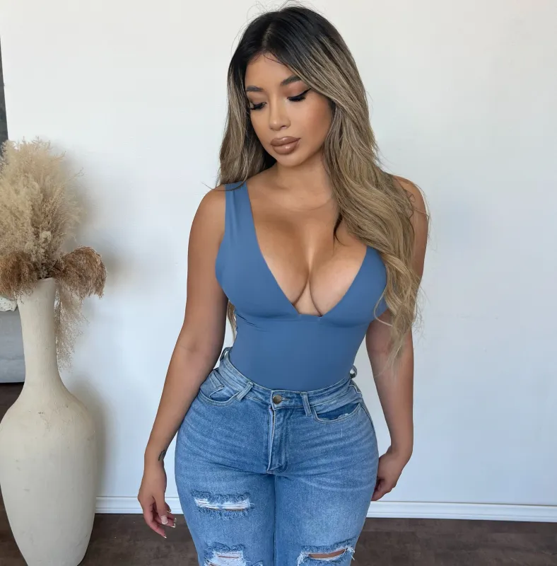 Ashanti Deep V Bodysuit (Denim Blue) sold by OOTDFash