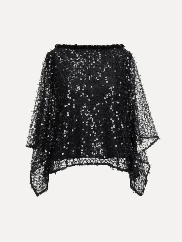 Floating Sequin Blouse sold by Oscar de la Renta