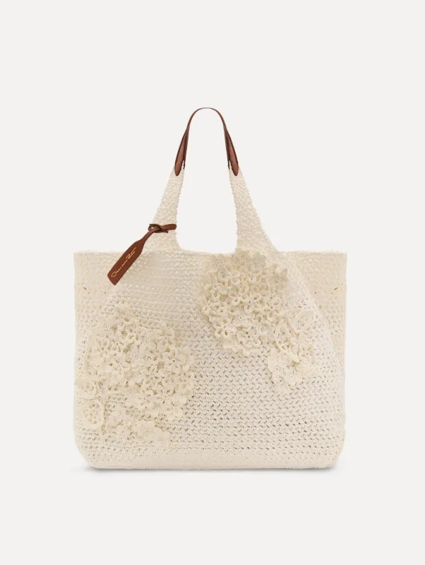 The Topaz in Crochet Raffia sold by Oscar de la Renta