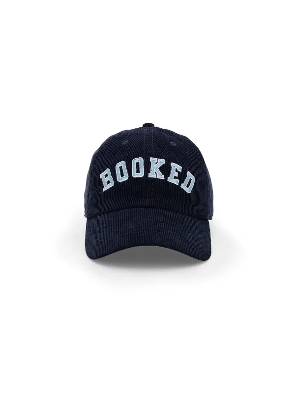 Booked cap made by Out of Print