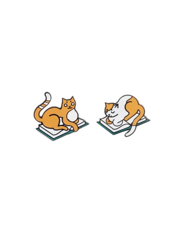 Curl Up with Books And Cats enamel pin set made by Out of Print