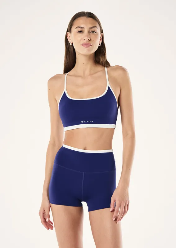 FUNDAMENTAL SPORTS BRA IN BRIGHT NAVY & WHISPER WHITE made by P.E Nation