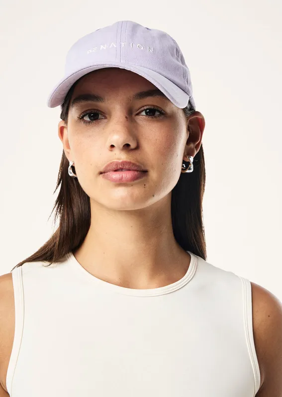 SHIFT CAP IN VIOLET CRUSH sold by P.E Nation