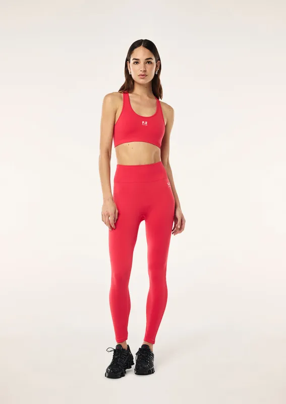 RESTORE SEAMLESS LEGGING IN STRAWBERRY sold by P.E Nation