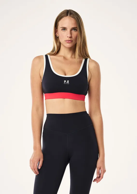 PURSUIT SPORTS BRA IN DARK SAPPHIRE sold by P.E Nation