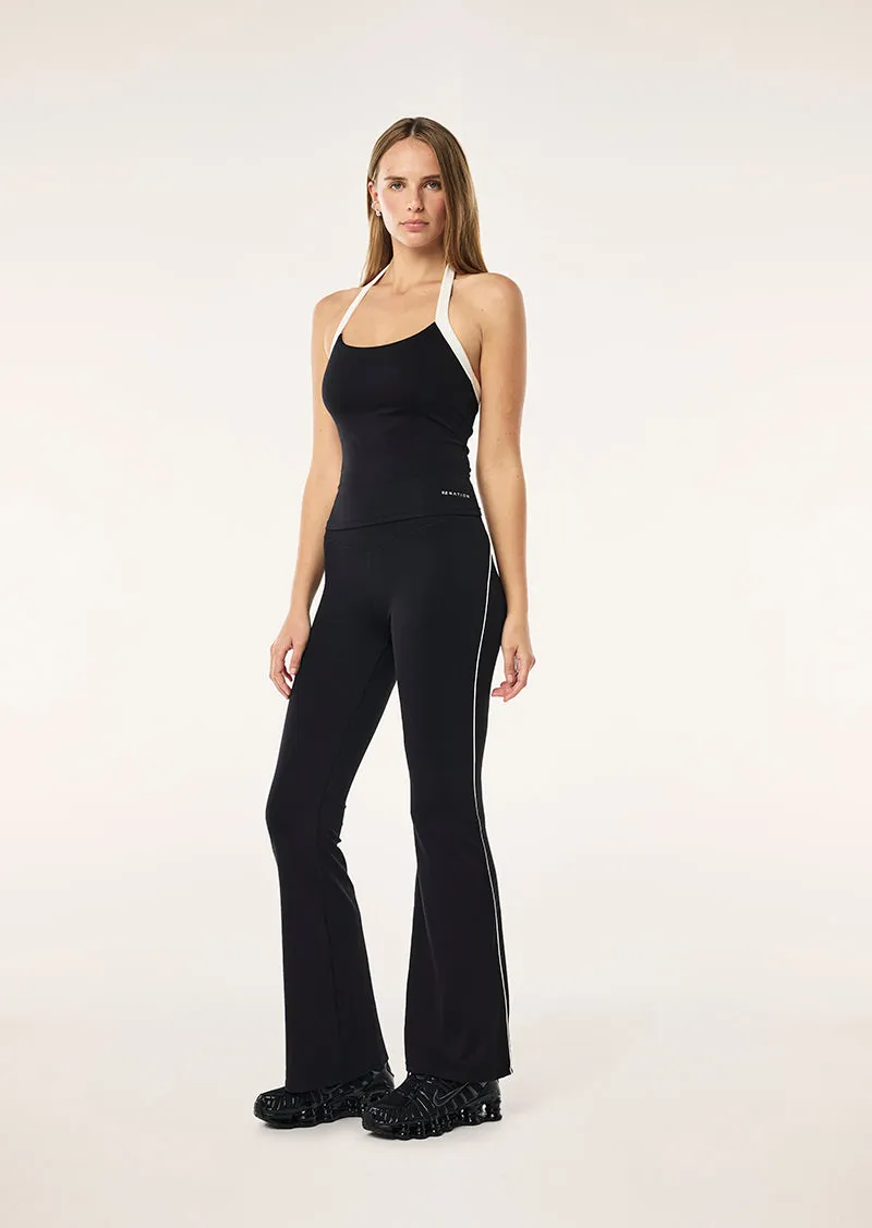 PREVIEW PIPING LEGGING IN BLACK & WHISPER WHITE sold by P.E Nation