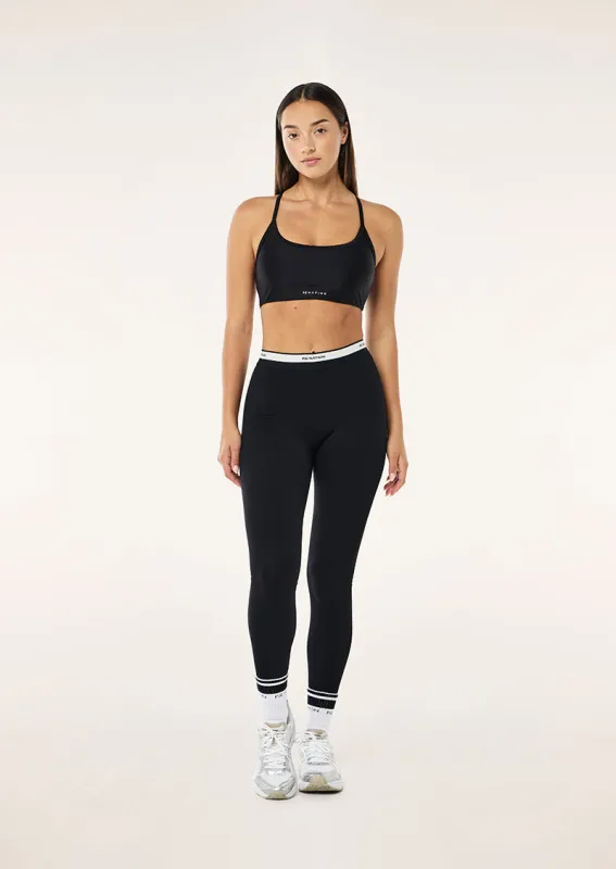 AVANT FULL LENGTH LEGGING IN BLACK & WHISPER WHITE sold by P.E Nation