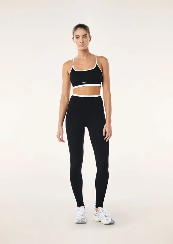 VITA FULL LENGTH LEGGING IN BLACK & OPTIC WHITE sold by P.E Nation