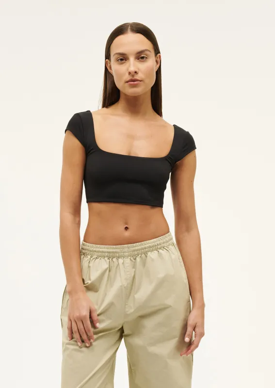 MANGNITUDE TANK IN BLACK sold by P.E Nation