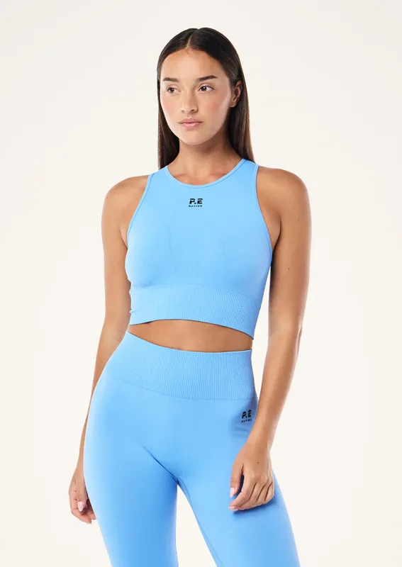 RESTORE SEAMLESS TANK IN CORNFLOWER BLUE sold by P.E Nation
