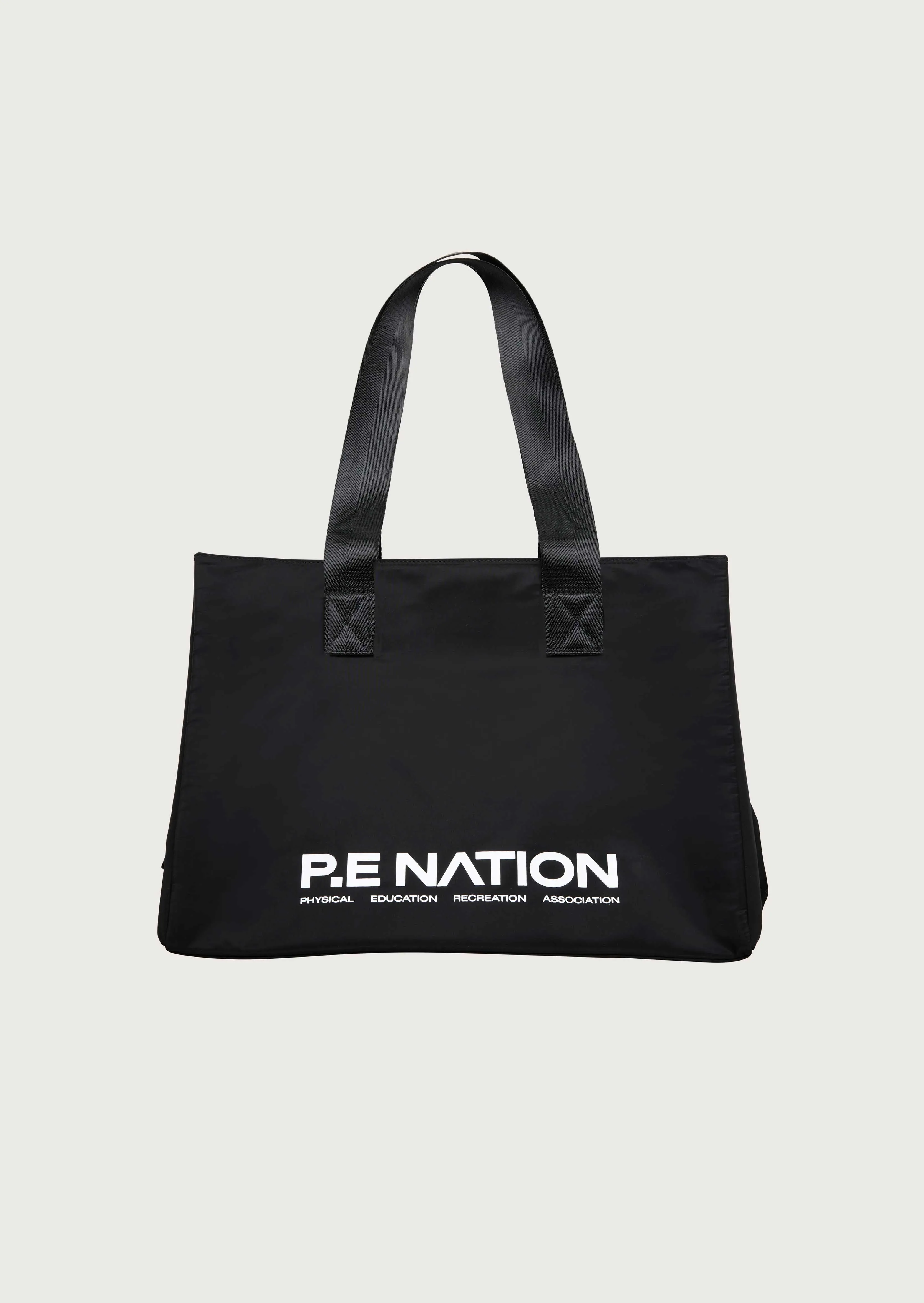HOMAGE TOTE IN BLACK sold by P.E Nation