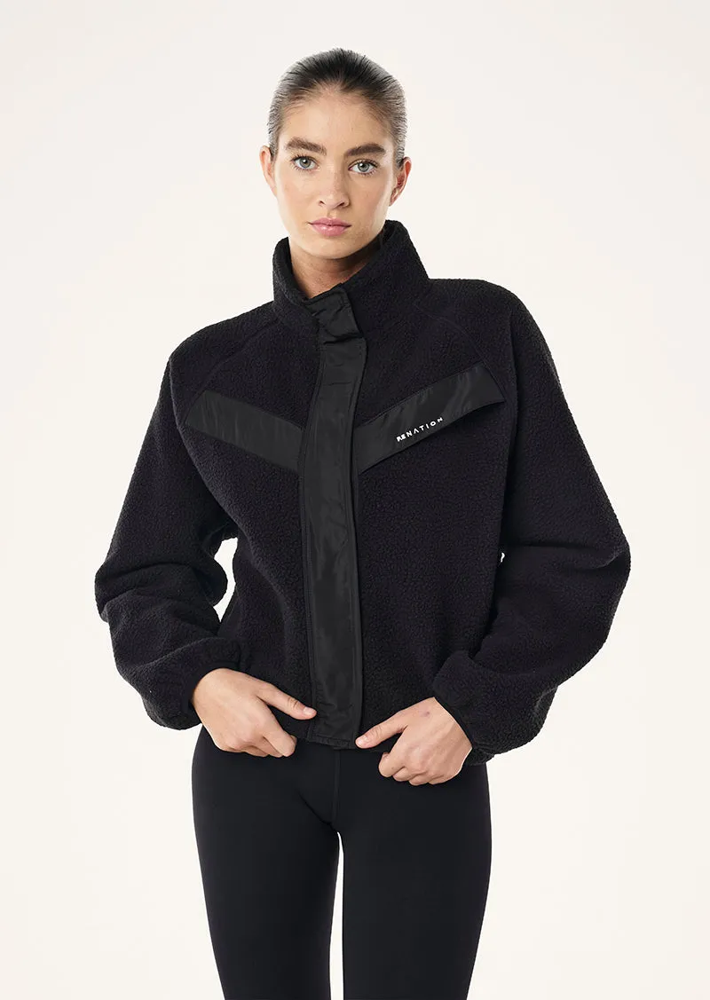 SHELTER SHERPA JACKET IN BLACK sold by P.E Nation