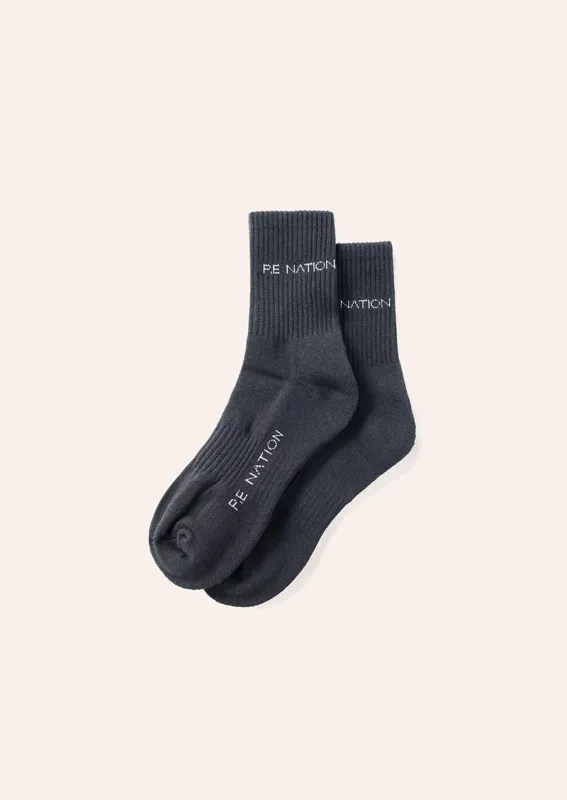 SIGNATURE SOCK IN BLACK & OPTIC WHITE made by P.E Nation