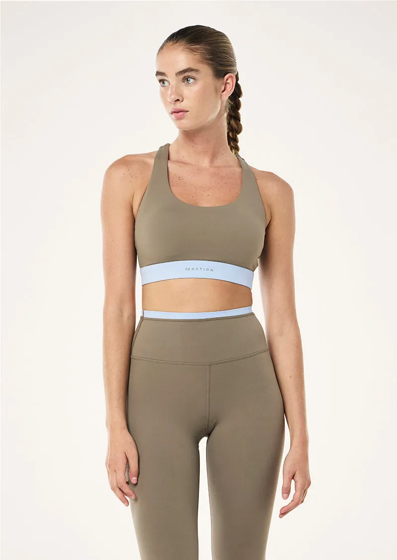 FREQUENCY SPORTS BRA IN FAWN & DUSTY BLUE sold by P.E Nation