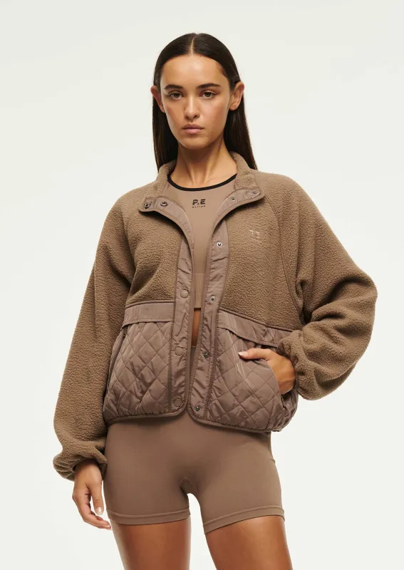 TECHNIQUE QUILT JACKET IN FOSSIL made by P.E Nation