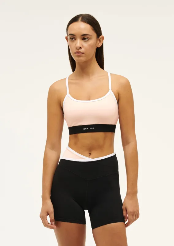 SIGNATURE SPORTS BRA IN BLUSH made by P.E Nation