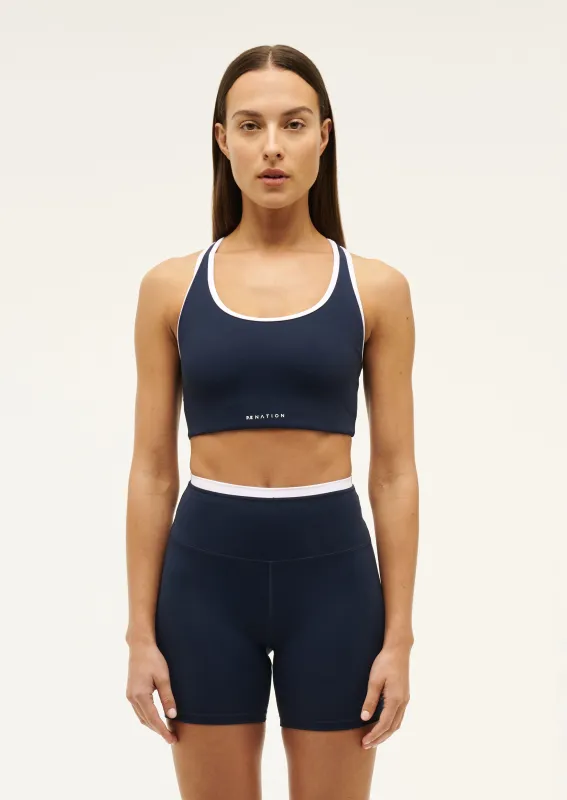 STELLAR SPORTS BRA IN DARK NAVY made by P.E Nation