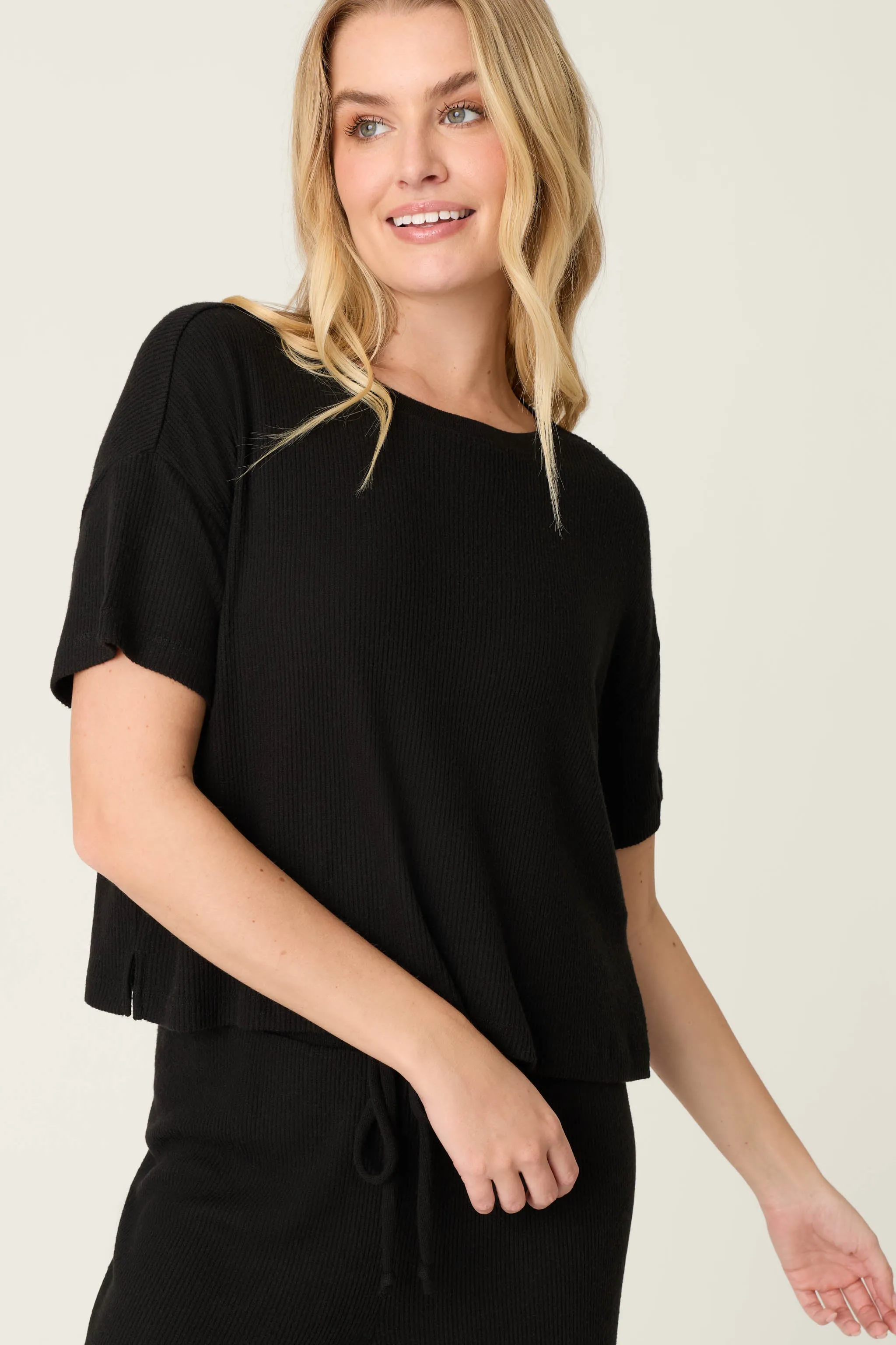 Textured Essentials Black Short Sleeve Top sold by P.J. Salvage