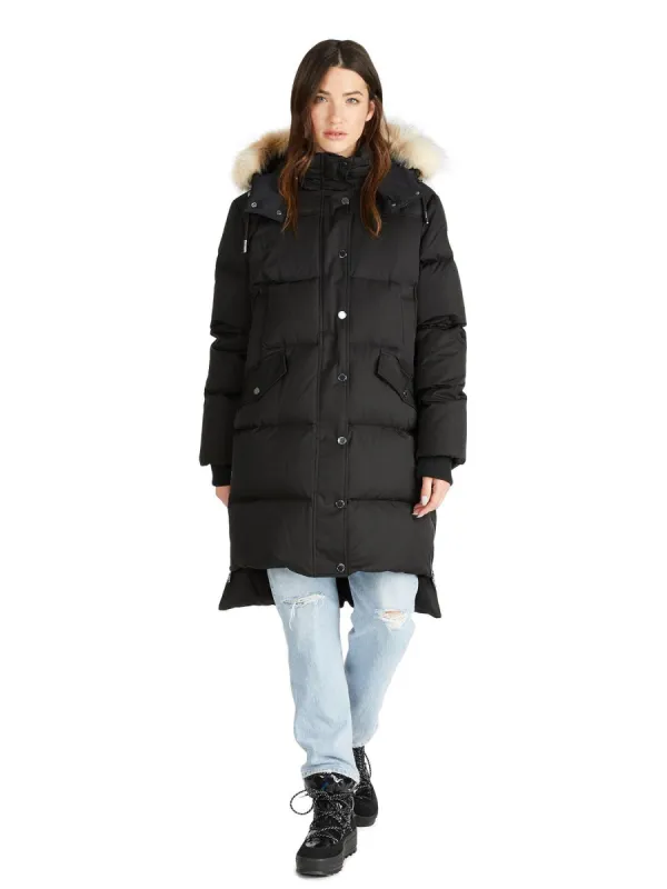 Reyna Women's Long Puffer w/ Faux Fur Trim sold by Pajar