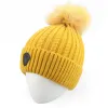 Heidi Knitted Pompom Hat sold by Pajar