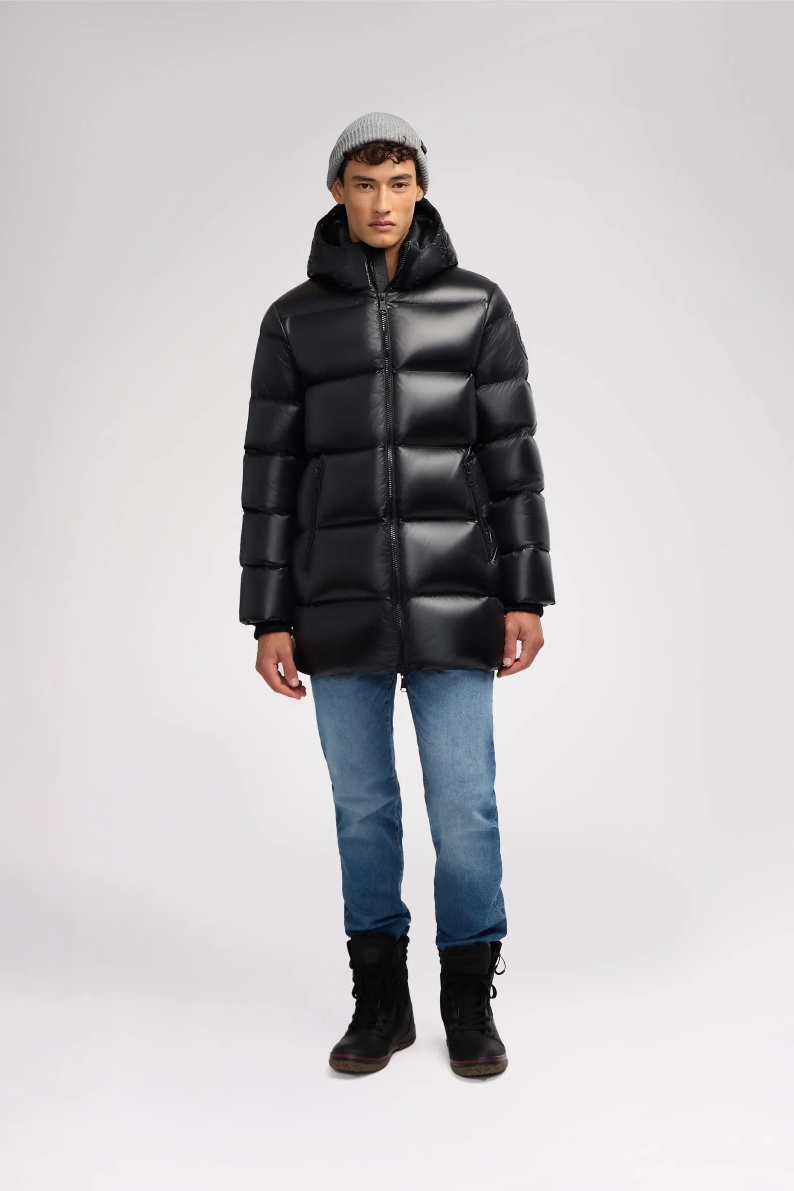 Dechen Men's Long Puffer w/detachable hood sold by Pajar