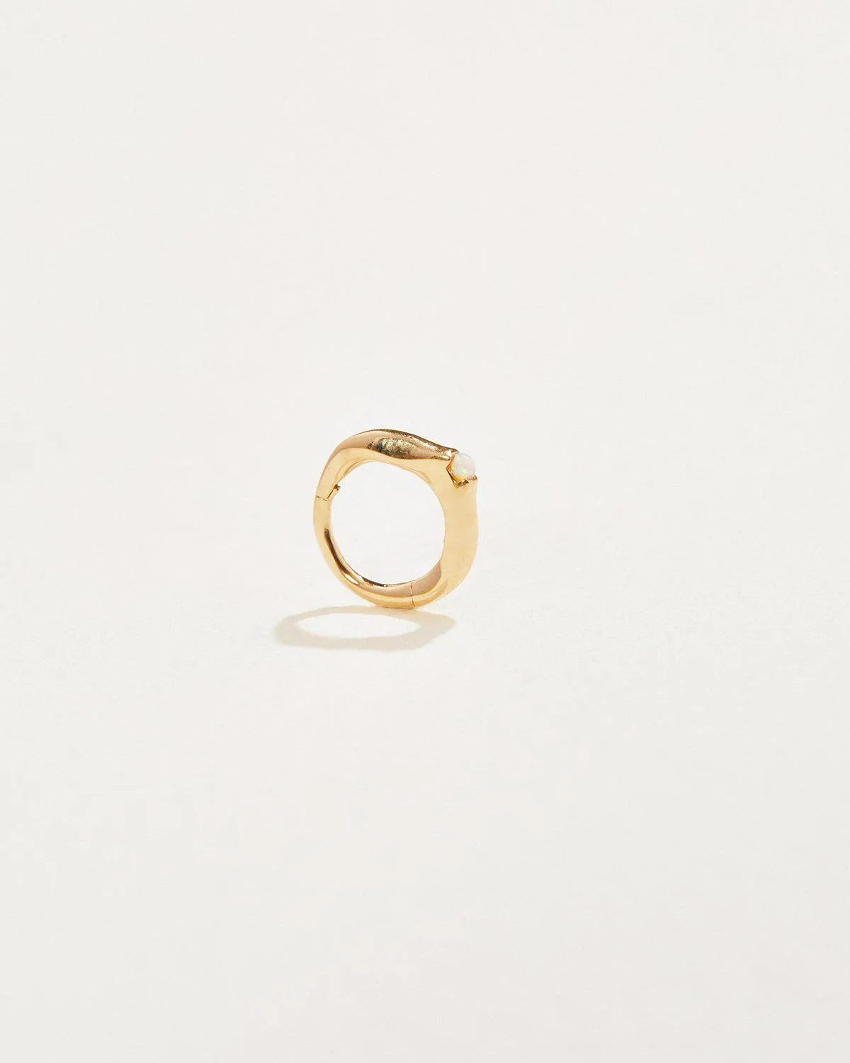 6mm Floating Stone Huggie sold by Pamela Love