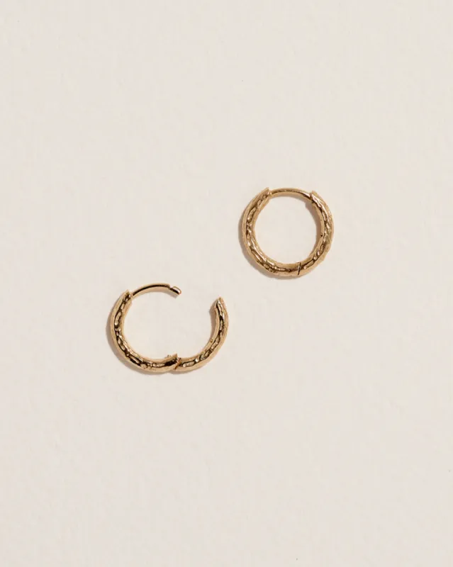 Hand Carved Huggie sold by Pamela Love