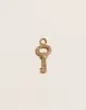 Fini’s Key Charm sold by Pamela Love
