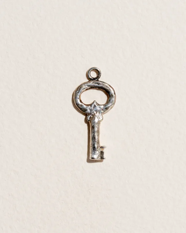 Fini’s Key Charm sold by Pamela Love