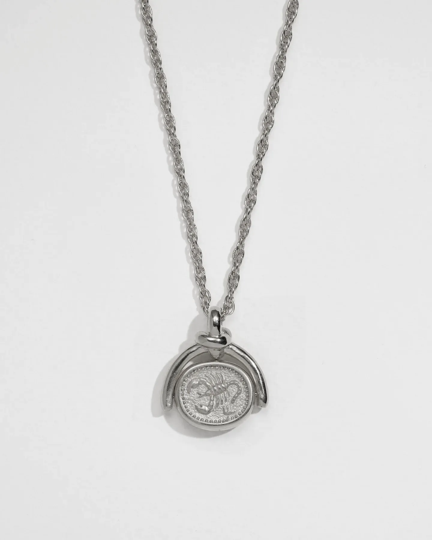 Scorpio Spinner Pendant sold by Pamela Love