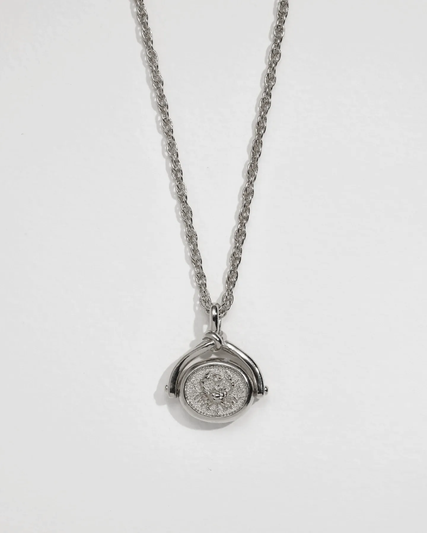 Cancer Spinner Pendant sold by Pamela Love