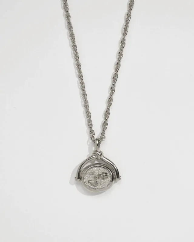 Aquarius Spinner Pendant sold by Pamela Love