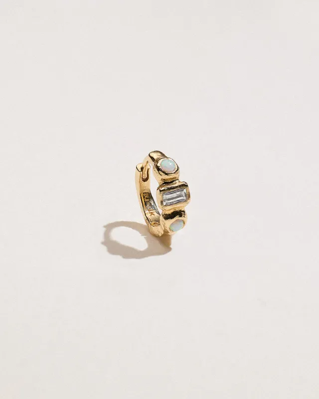 Molten Assemblage Huggie sold by Pamela Love