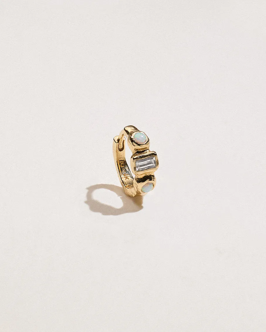 Molten Assemblage Huggie sold by Pamela Love