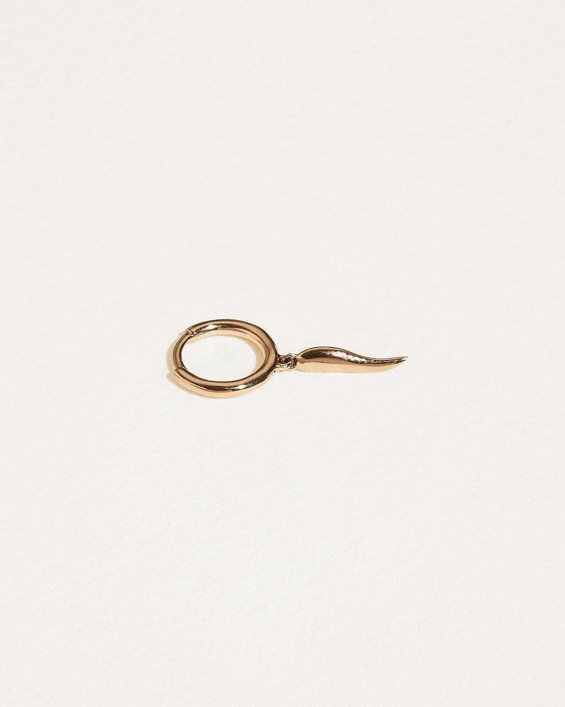 Italian Horn Huggie sold by Pamela Love