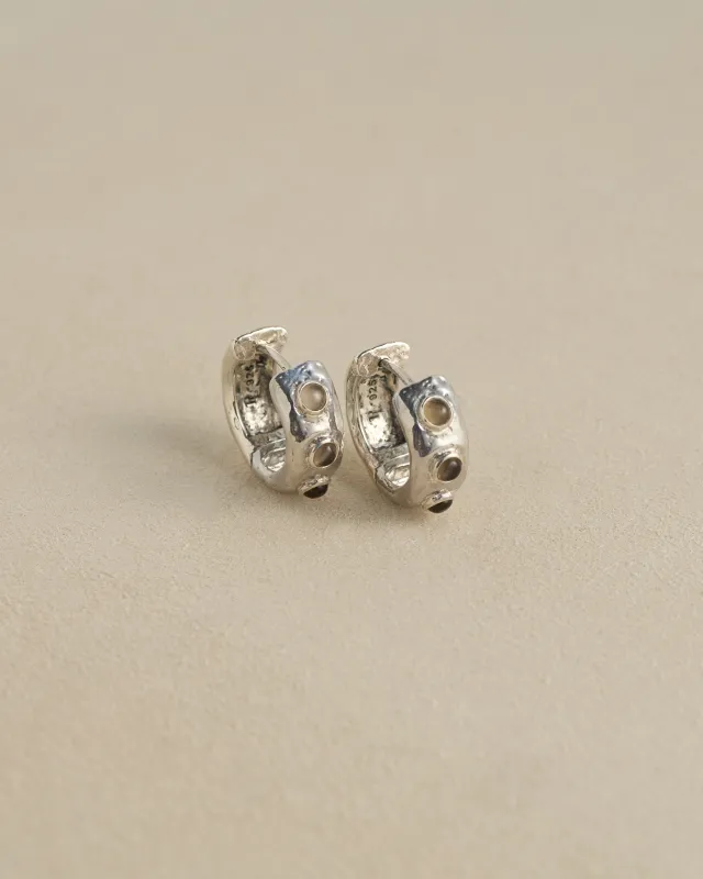 Stone Tube hoop sold by Pamela Love