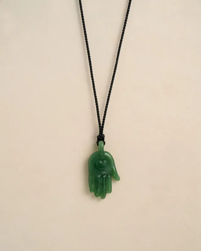 Heart in Hand Pendant made by Pamela Love