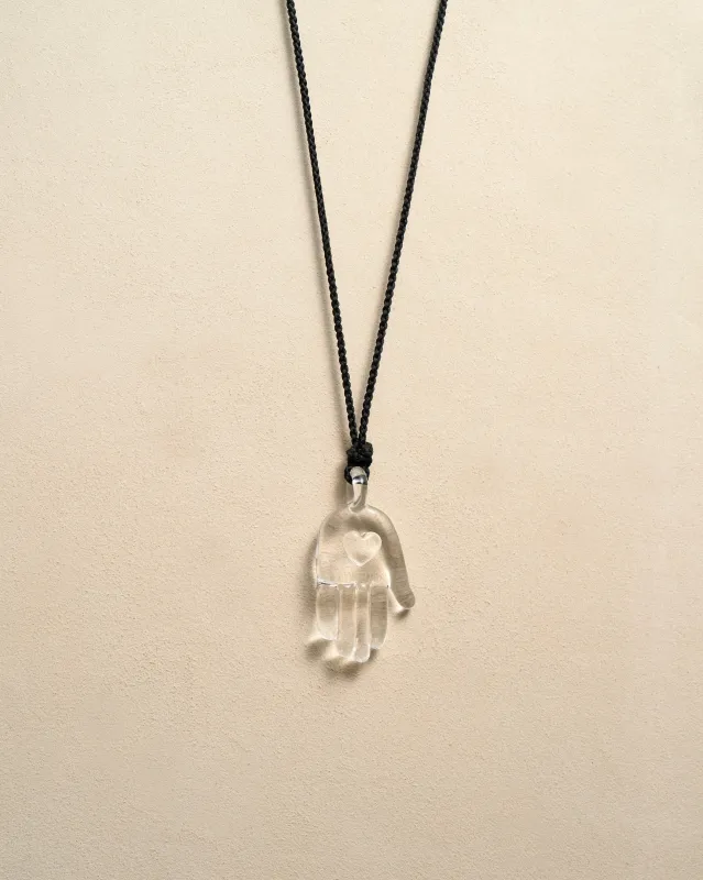 Heart in Hand Pendant made by Pamela Love