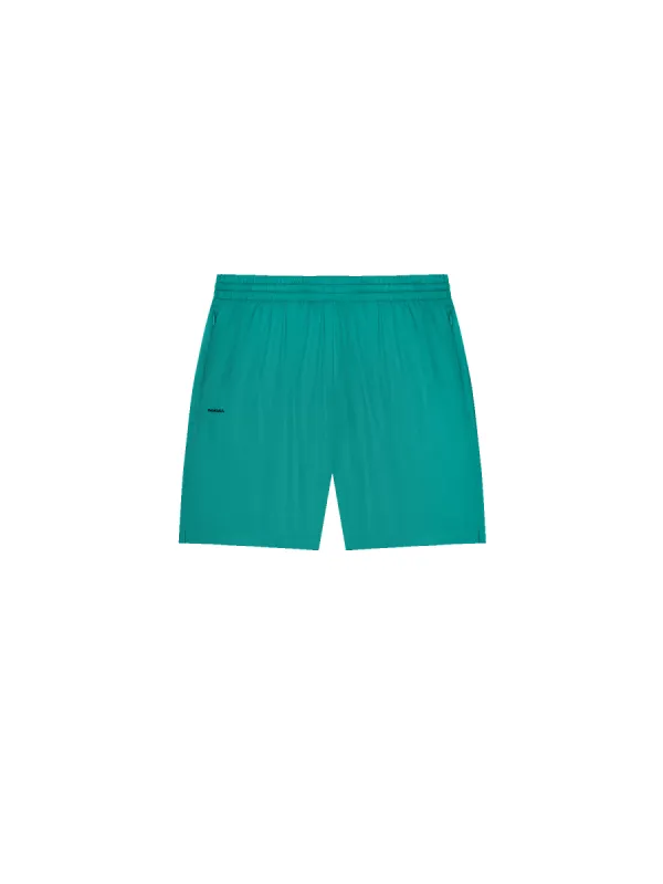 Womens DNA Recycled Nylon Shorts—scarab teal sold by Pangaia